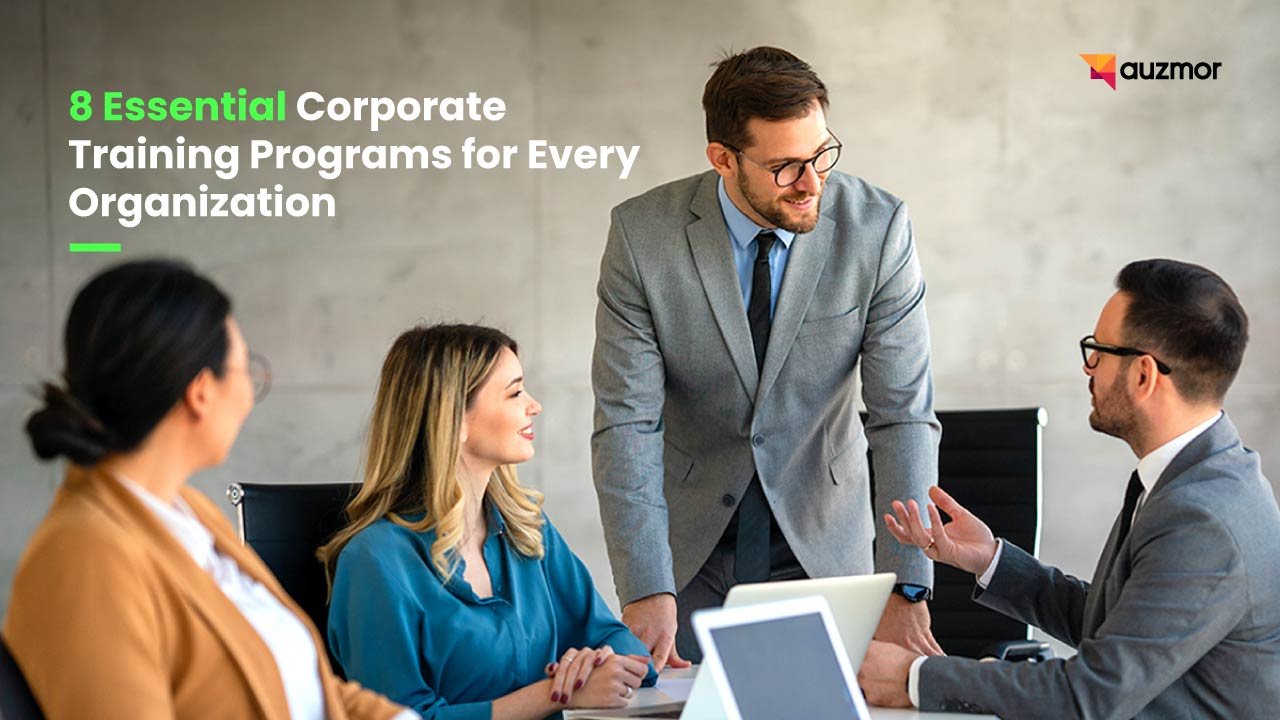 Manager leading a team meeting, with the title 8 Essential Corporate Training Programs for Every Organization