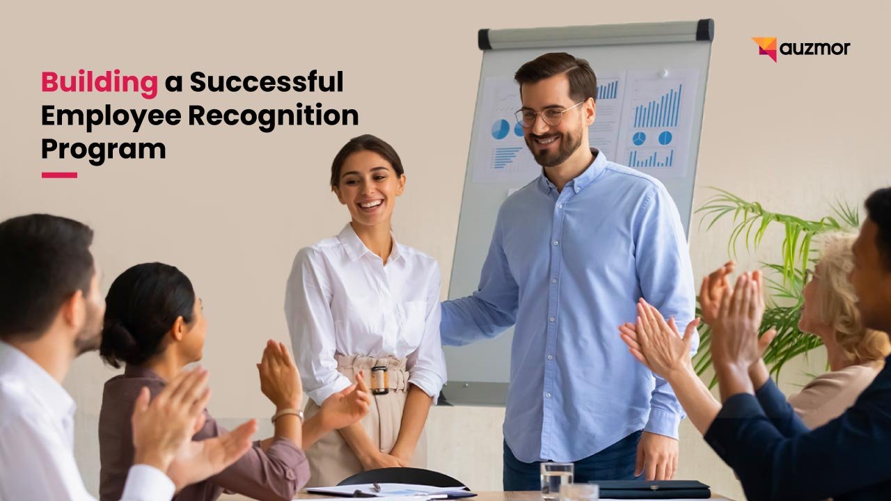Team applauding a colleague at a presentation, with the title Building a Successful Employee Recognition Program