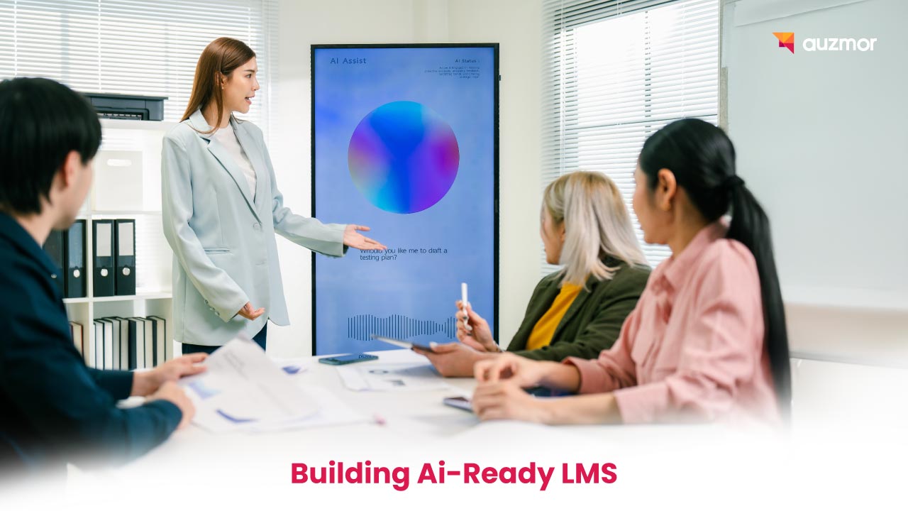Team in a meeting room watching a presenter at a large screen, with the title Building AI-Ready LMS