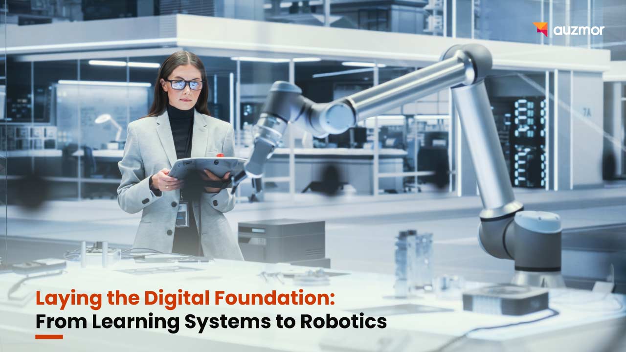 Woman with a tablet beside a robotic arm in a lab, with the title Laying the Digital Foundation: From Learning Systems to Robotics