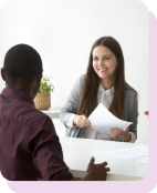 Recruiter smiling while interviewing a job candidate