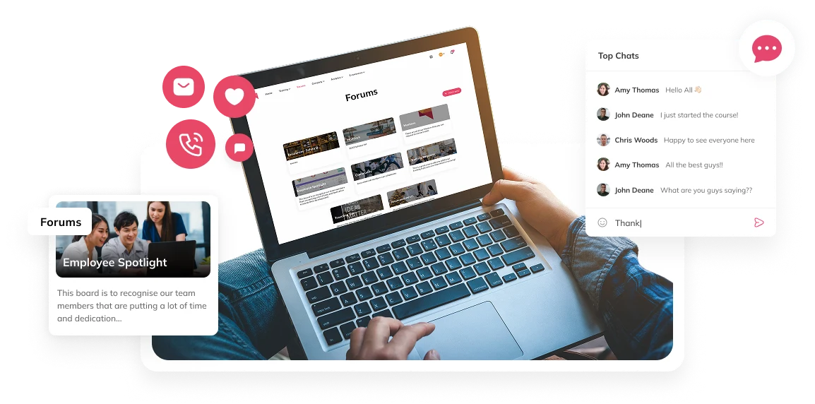Employee on a laptop using Auzmor Learn forums, chats and likes for social learning