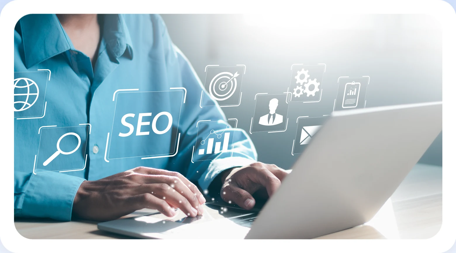 Person typing on a laptop surrounded by SEO and search analytics icons