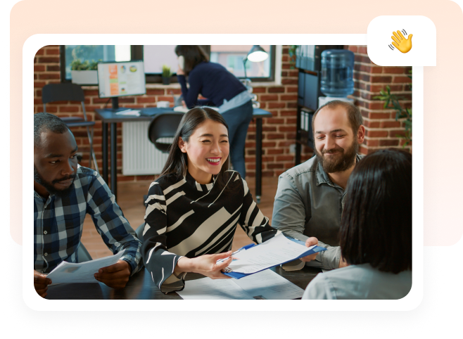 Hiring team discussing candidates together around a table