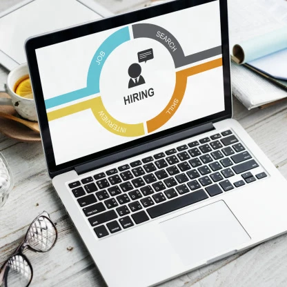 Laptop showing a hiring cycle chart with job, search and interview stages