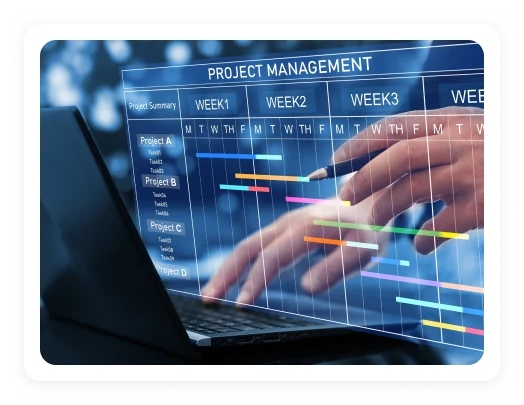 Hand on a laptop showing a weekly project management timeline