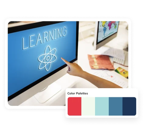 Hand pointing at a learning screen beside a colour palette